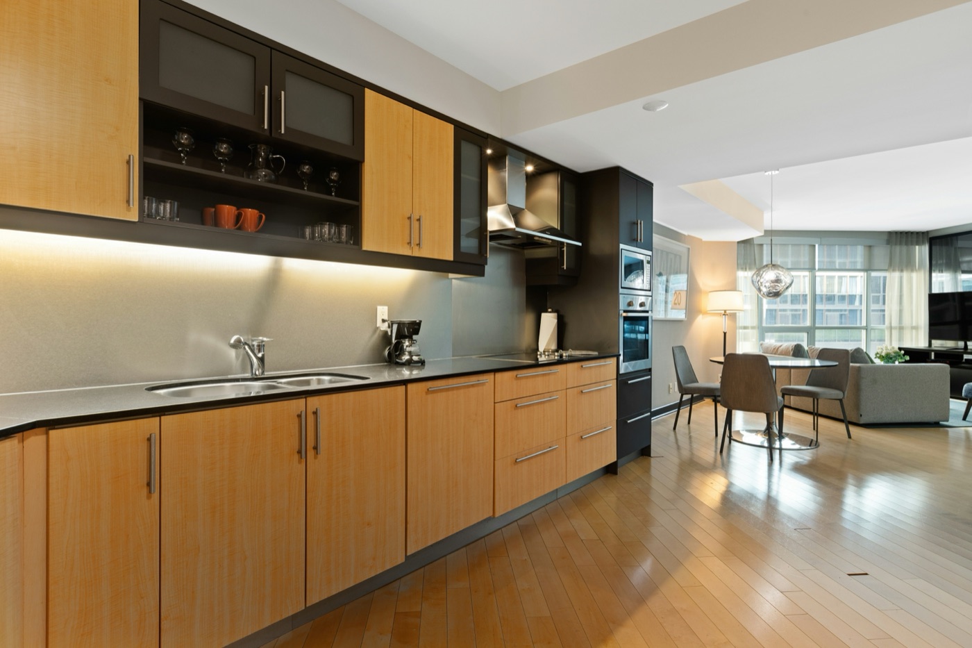 Modern white-oak open shelving and cabinetry
